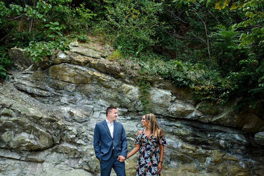 A man and woman have a sweet moment during their engagement session in Hoboken, NJ.
